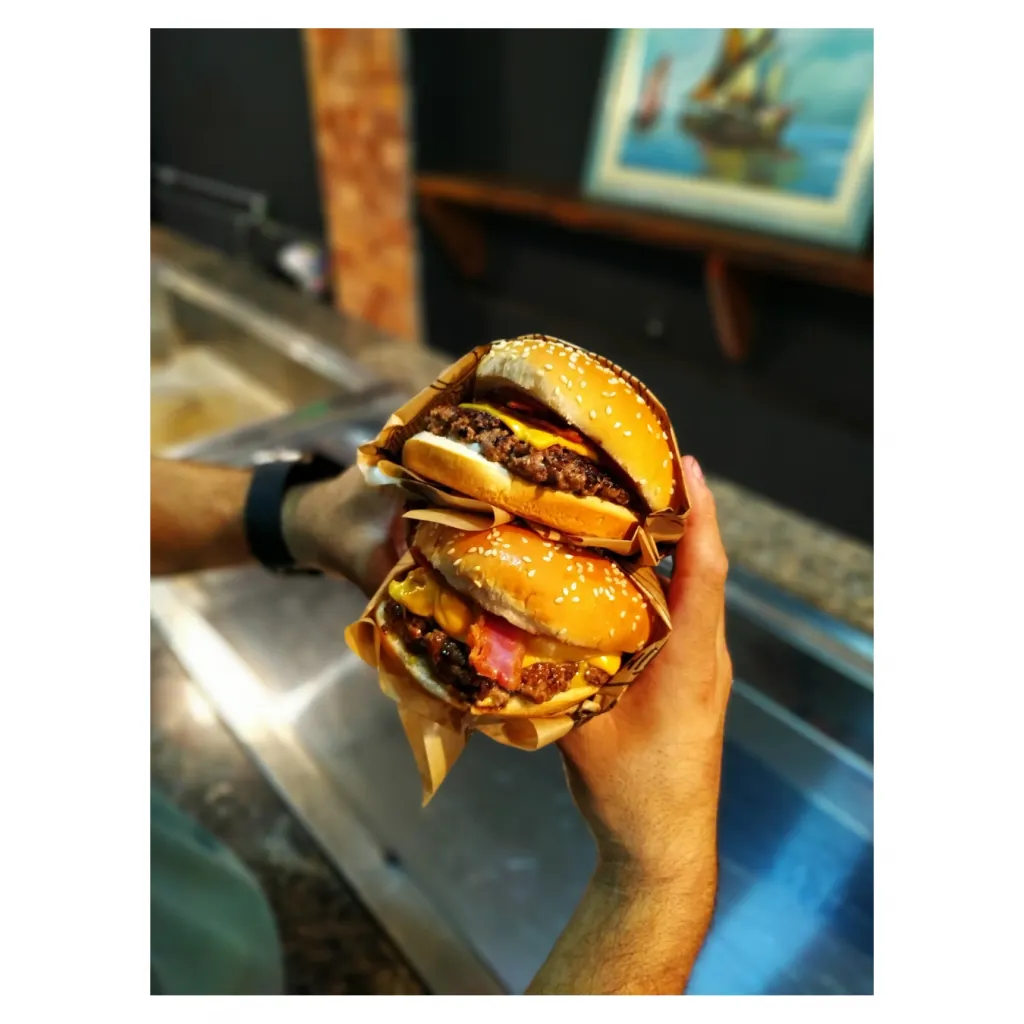 Smash burgers ICLATE préparés pour un événement